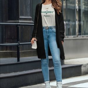 Fuzzy black Cardigan with Pockets.